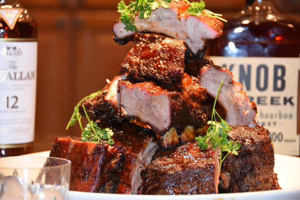 Grilling barbecue chicken and pork with spices